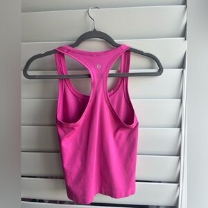 Pink Lululemon Swiftly Tech Racerback Tank Top 2.0
Waist Length women’s size 0/2